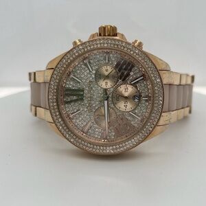 Rose Gold tone Michael Kors ladies watch with cz/crystal bezel and dial.